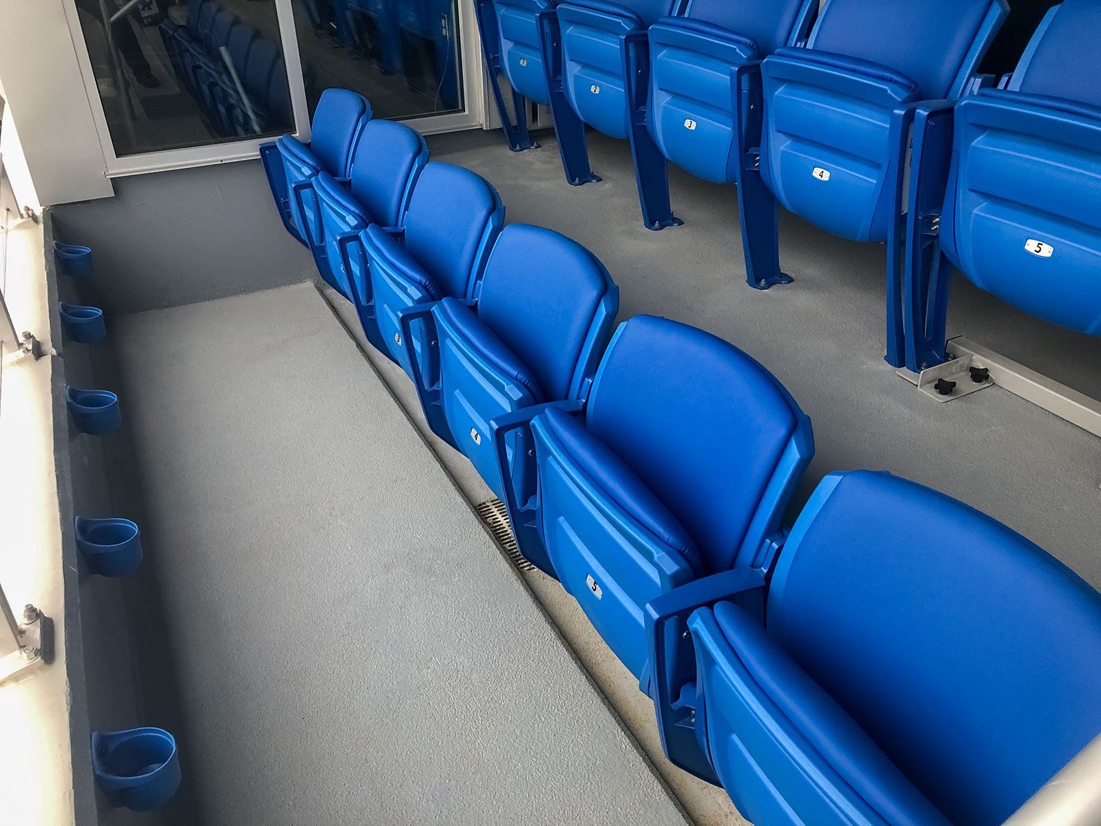 Blue Interkal upholstered AURA Solid Stadium Chairs, and AURA Slat Stadium Chairs at the University of Kentucky stadium.