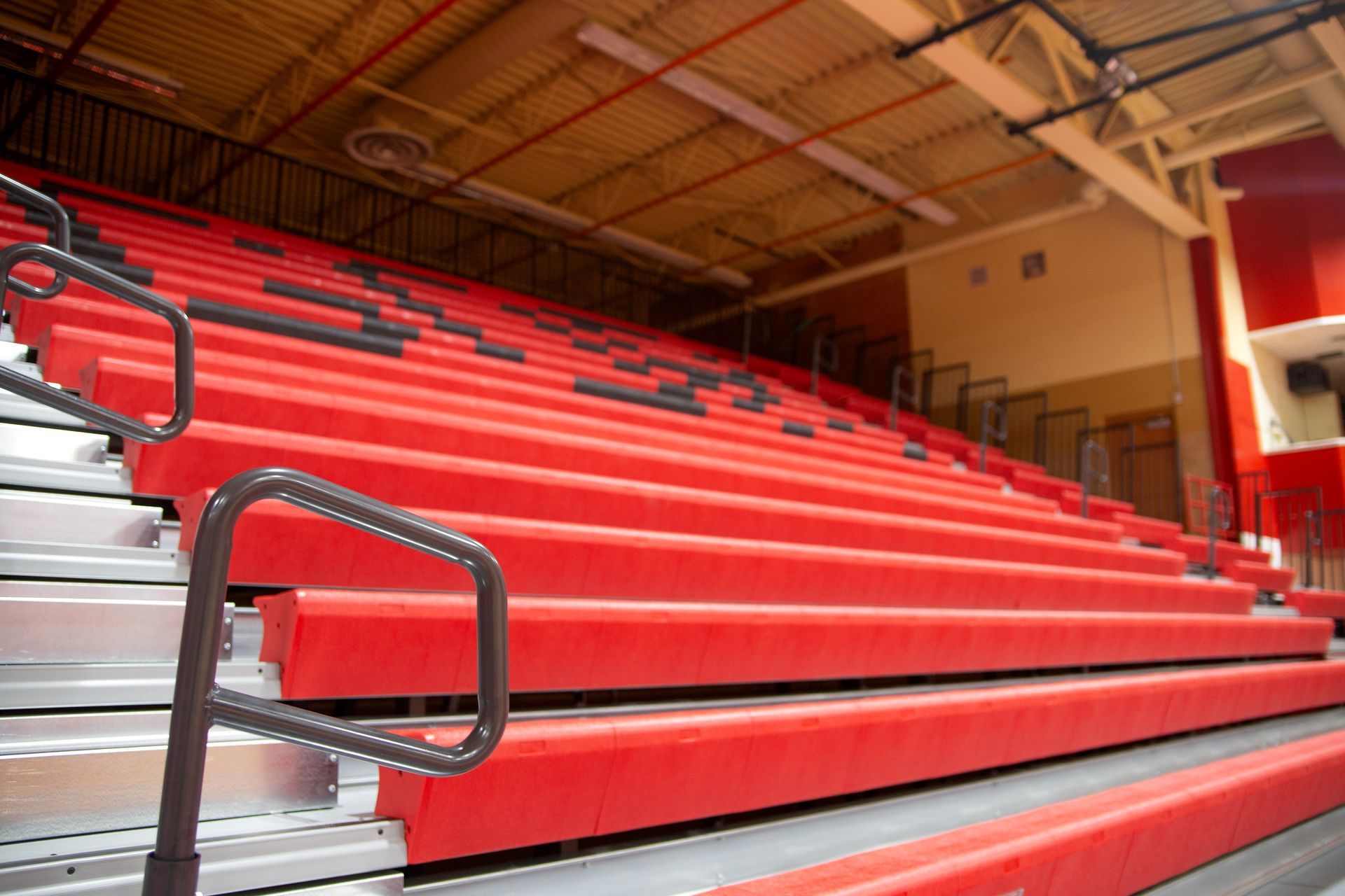 A photo of the EXCEL Seat Module telescopic bleacher installation at Bangor High School.