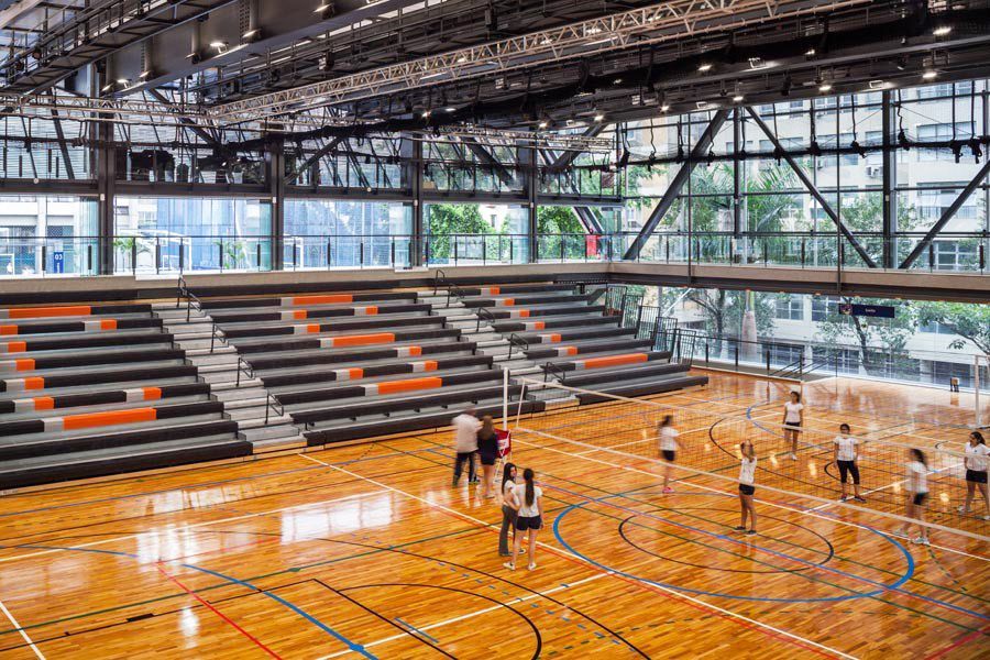 Black EXCEL Seat Modules with Orange and Grey modules spelling CSL on the telescopic platform at this fieldhouse.