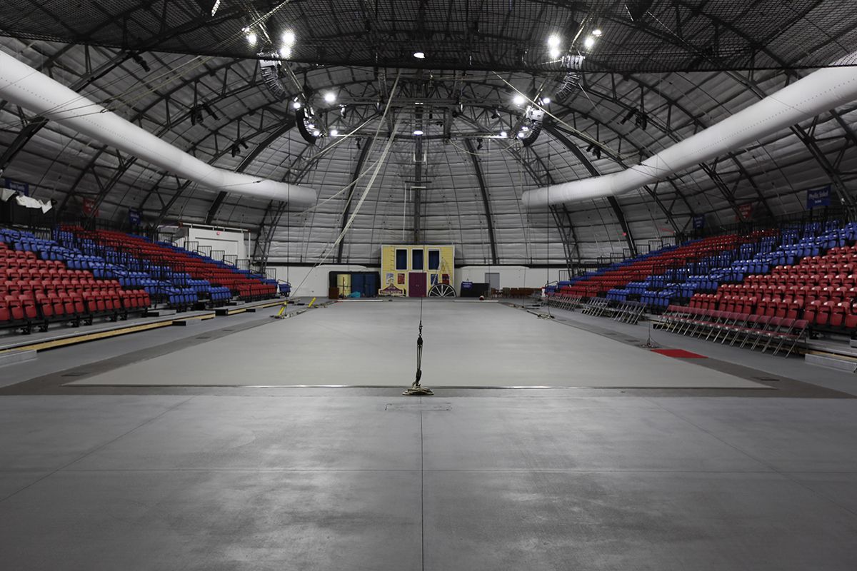 Red, Blue Interkal VISION Platform Chairs on a Wide Deck Premier Platform at the Circus Arts Conservatory in Florida.