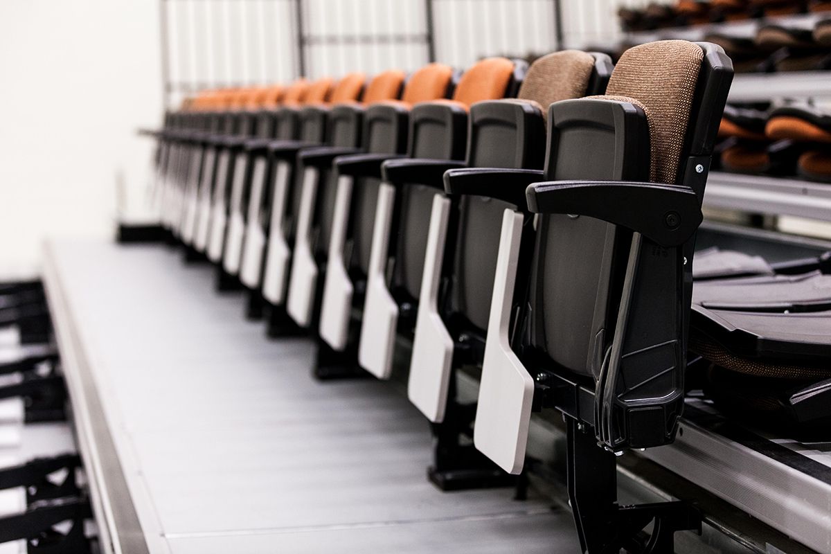 Interkal upholstered VISION Platform chairs with tablet arms on a Wide Deck Premier Platform at Cornell Secondary School.