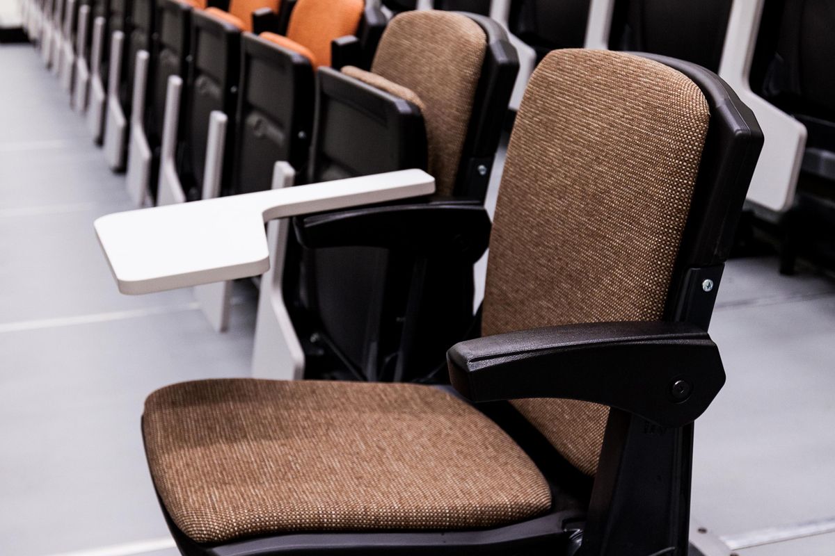 Interkal upholstered VISION Platform chairs with tablet arms on a Wide Deck Premier Platform at Cornell Secondary School.