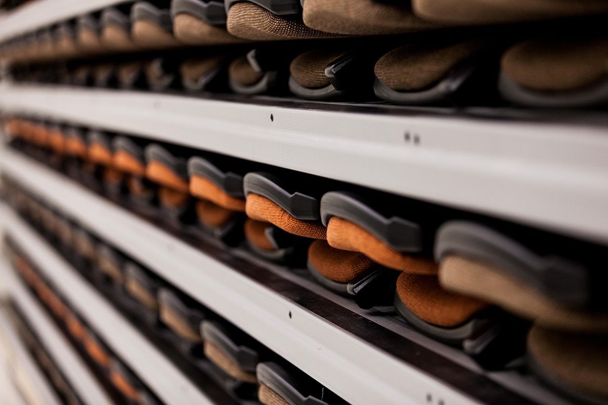 Interkal upholstered VISION Platform chairs with tablet arms on a Wide Deck Premier Platform at Cornell Secondary School.