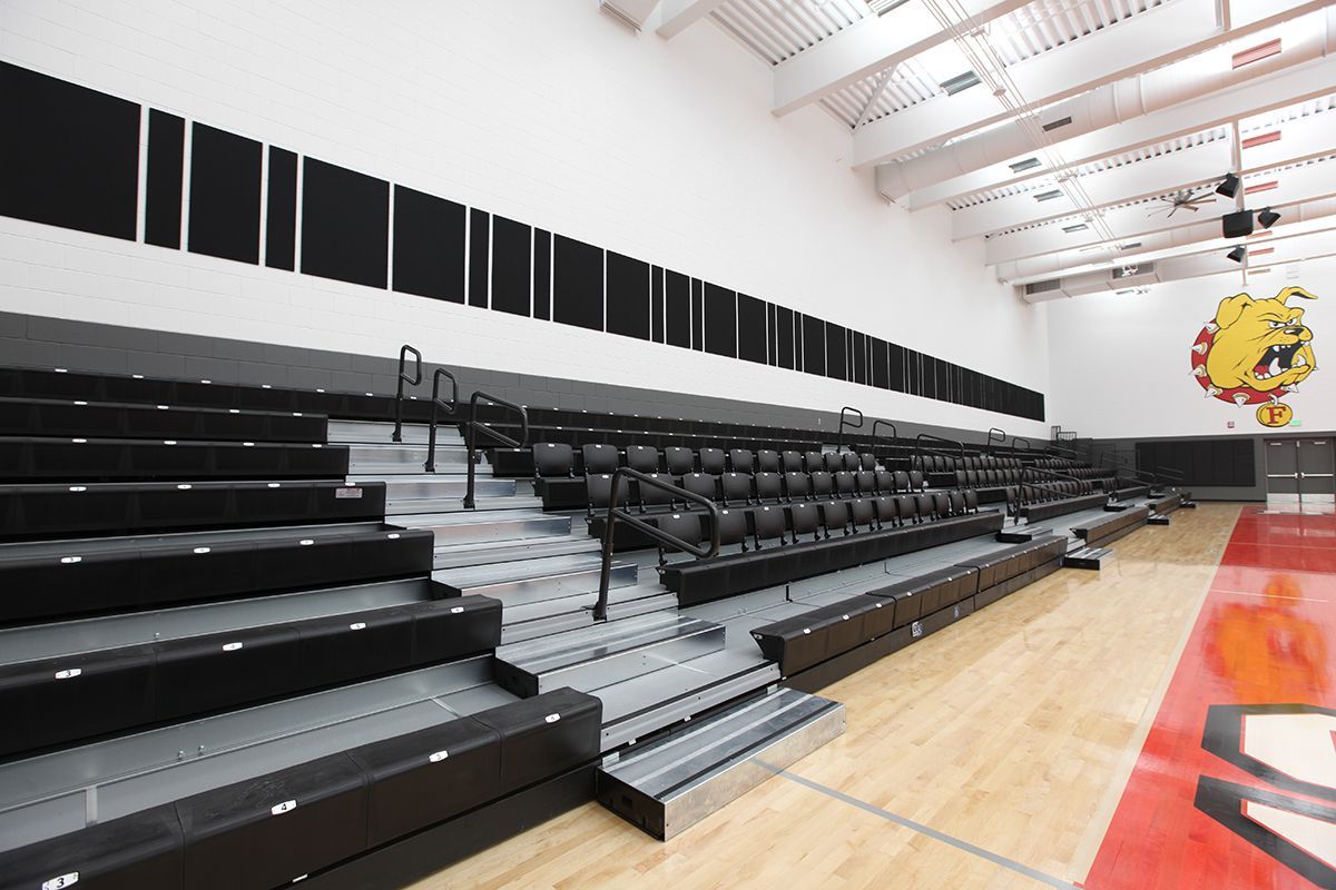 Interkal EXCEL Seat Modules with ComfoBack Backrests on a Wide Deck Premier Platform at the Ferris State University gym.