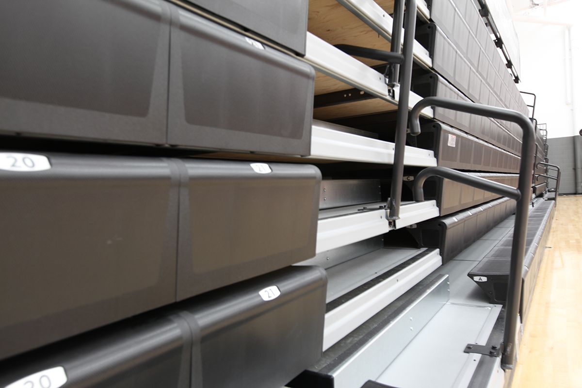 Interkal EXCEL Seat Modules with ComfoBack Backrests on a Wide Deck Premier Platform at the Ferris State University gym.