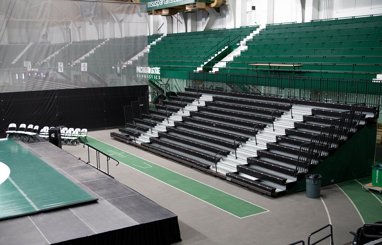 EXCEL seat modules with Self-Storing Aisle Rails on a mobile telescopic system at Michigan State's Jenison Field House.