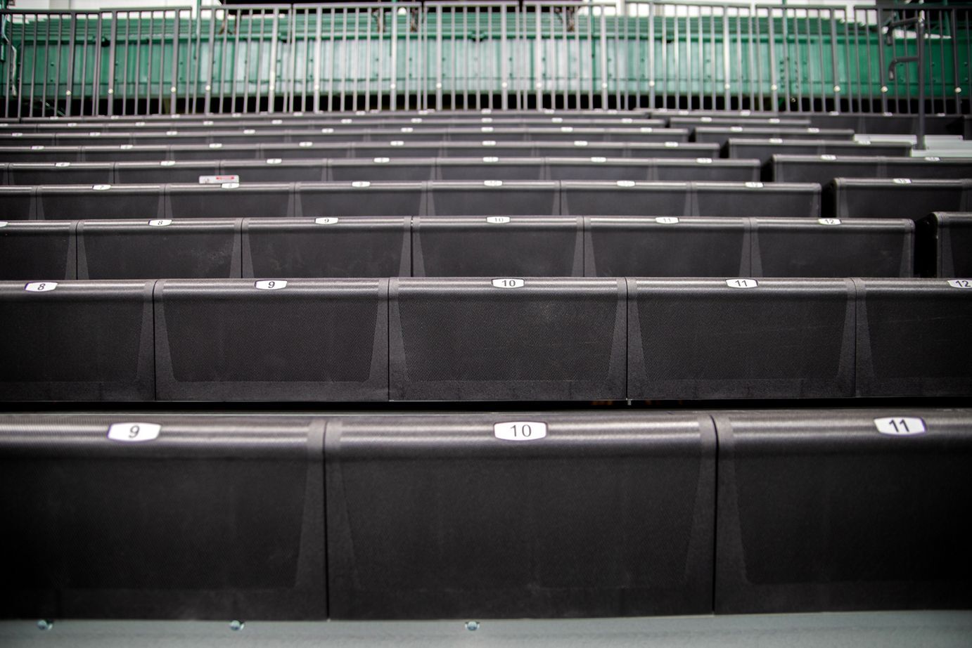 Black Interkal EXCEL Seat Modules on a mobile telescopic bleacher system at Michigan State's Jenison Field House.