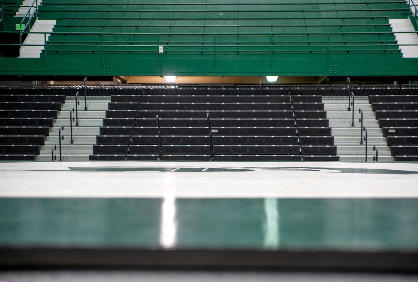 EXCEL seat modules with Self-Storing Aisle Rails on a mobile telescopic system at Michigan State's Jenison Field House.