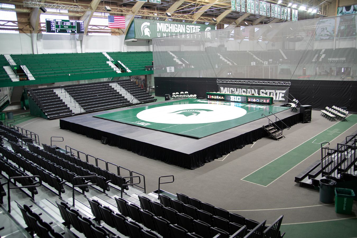 VISION Platform Chairs with armrests on a mobile Wide Deck Premier Platform system at Michigan State's Jenison Field House.