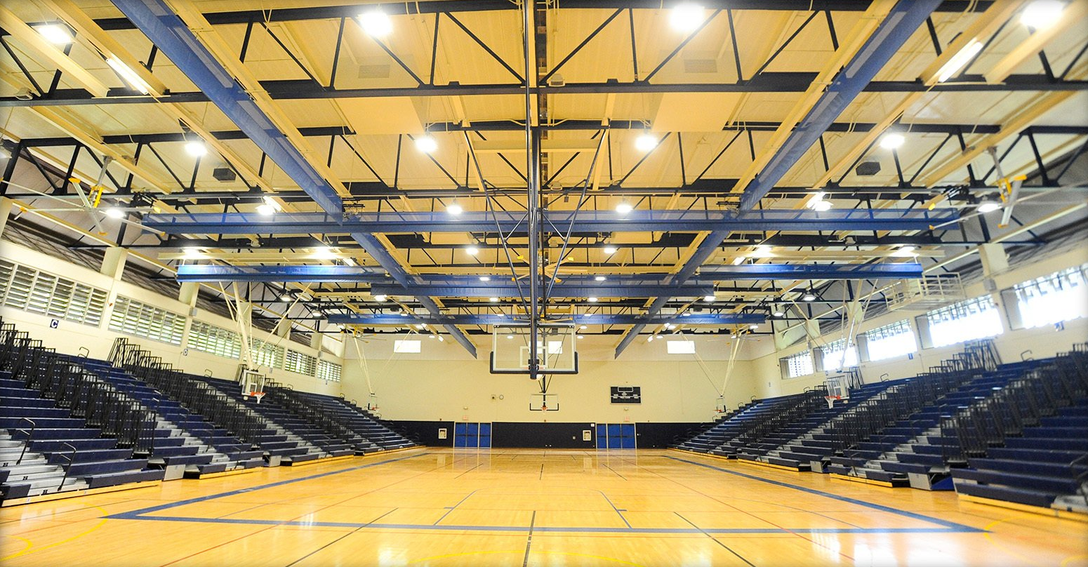 Blue Interkal EXCEL Seat Modules on a telescopic bleacher with Self-Storing Aisle Rails in Kekuhaupio, Hawaii.