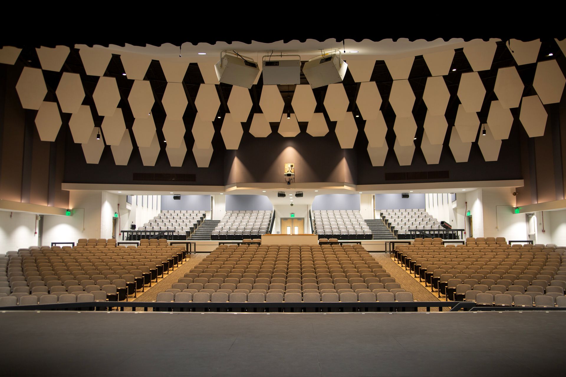 The auditorium at Montbello High School in Colorado, featuring ODYSSEY Auditorium Chairs with hardwood armrests, end panels.