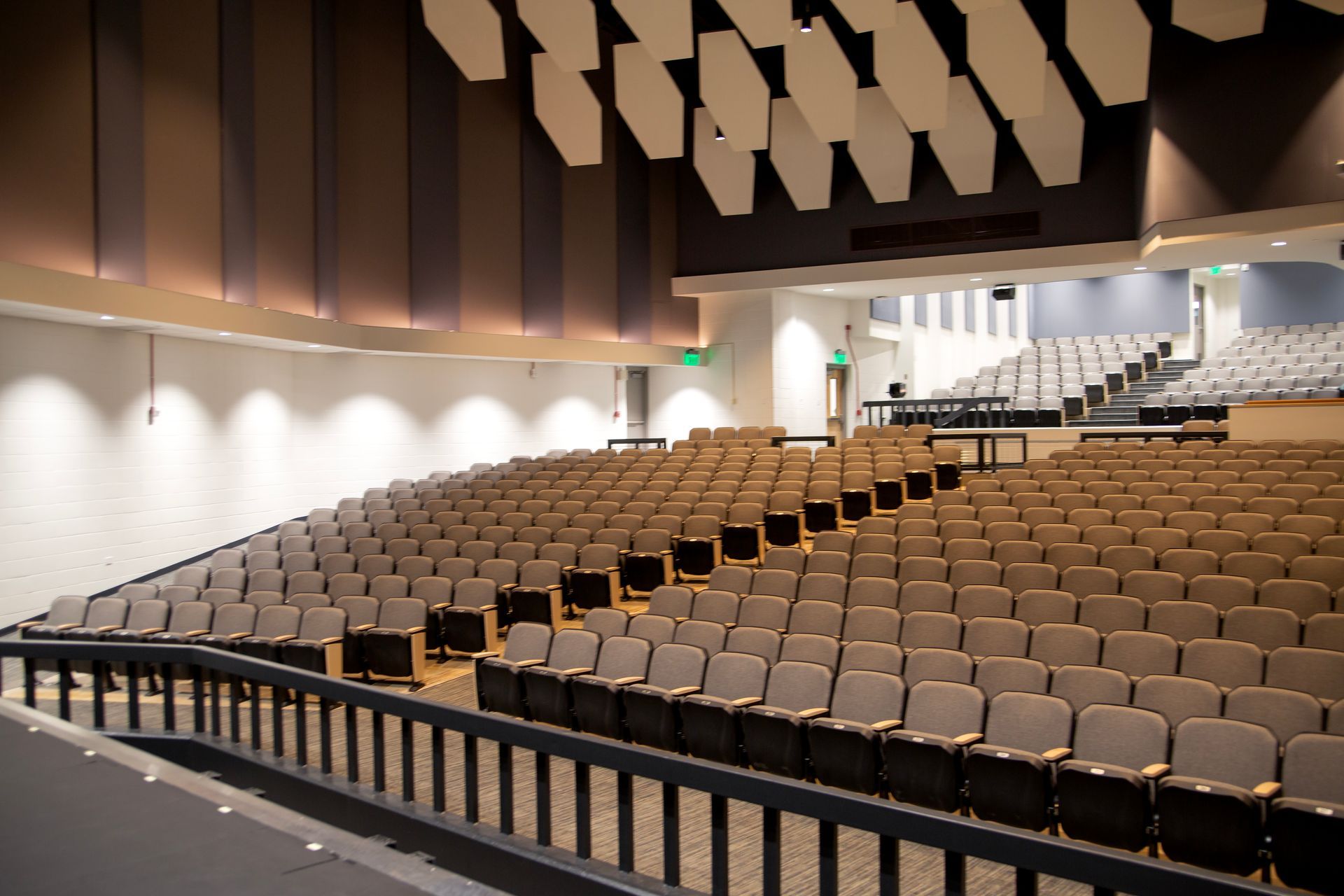 The auditorium at Montbello High School in Colorado, featuring ODYSSEY Auditorium Chairs with hardwood armrests, end panels.
