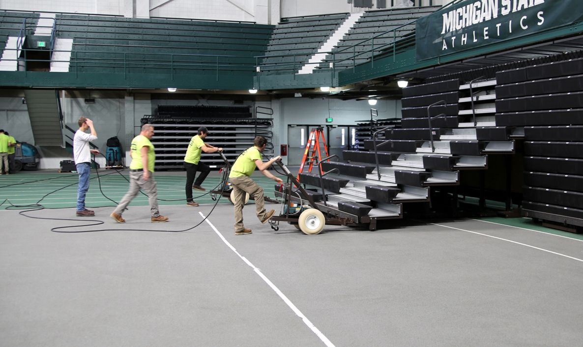 The Interkal Moto-Folder in use to retract a set of mobile bleachers at the Jenison Fieldhouse at Michigan State University.