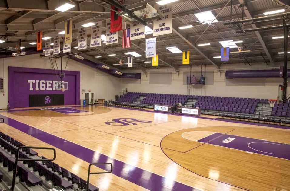 Purple Interkal VISION Platform Chairs on a wide deck premier platform in the gymnasium at Sewanee University.