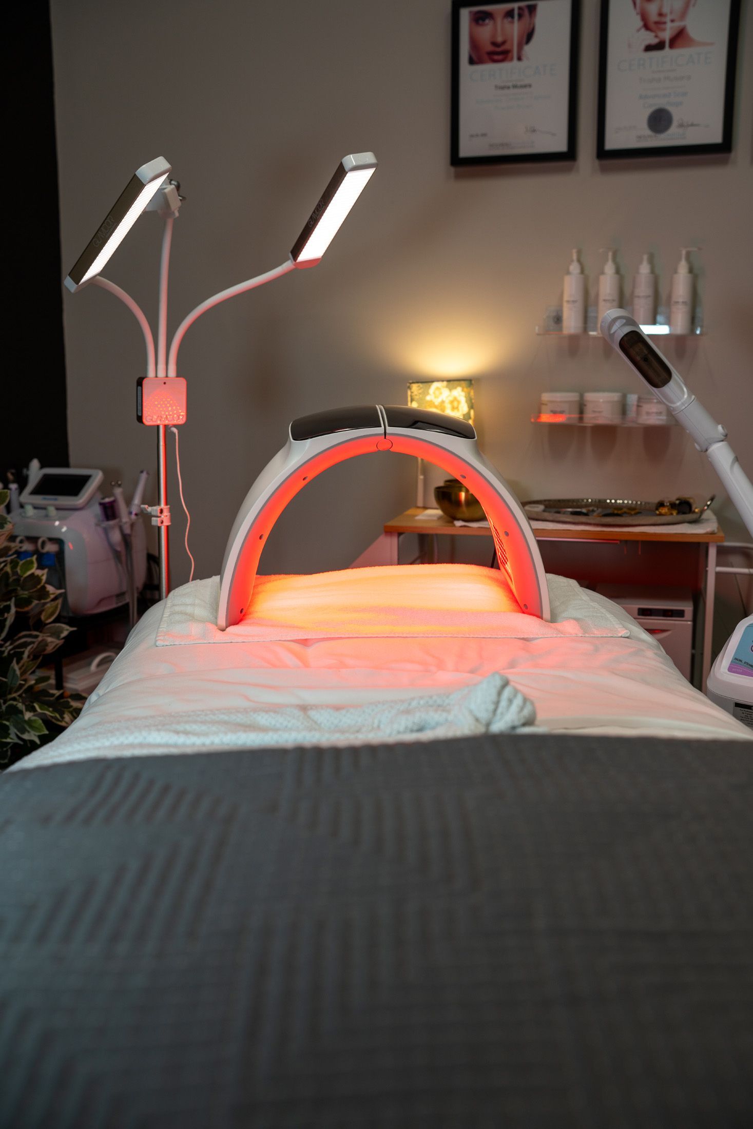 LED light therapy bed in a spa setting. Red light shining, waiting for treatment.