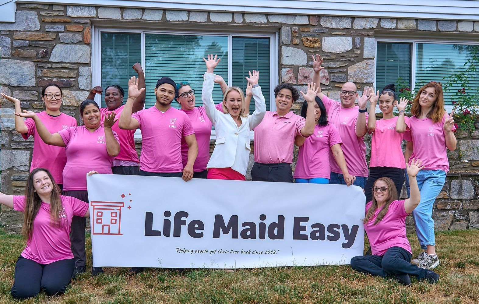 group photo of Life Maid Easy team and employees