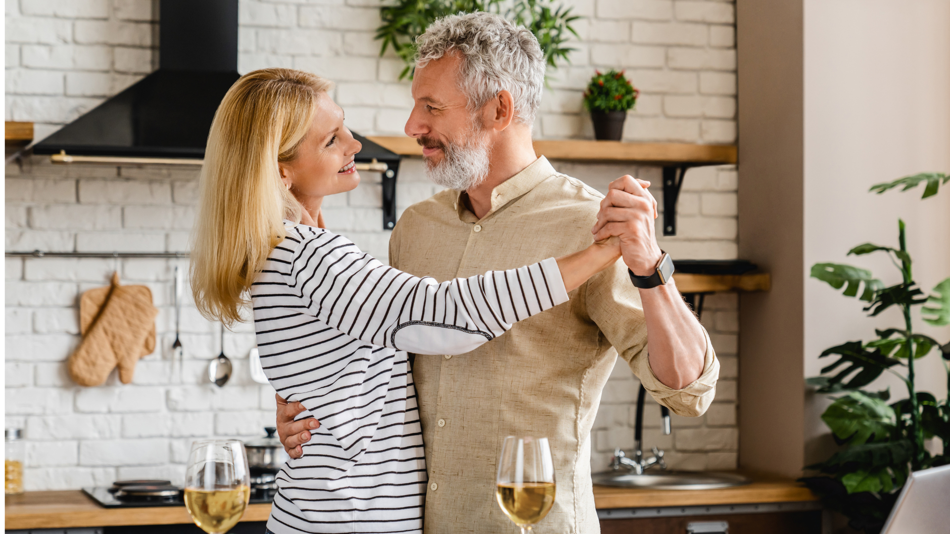 Man and Woman dancing in a kitchen