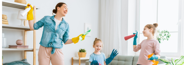 a woman and children cleaning