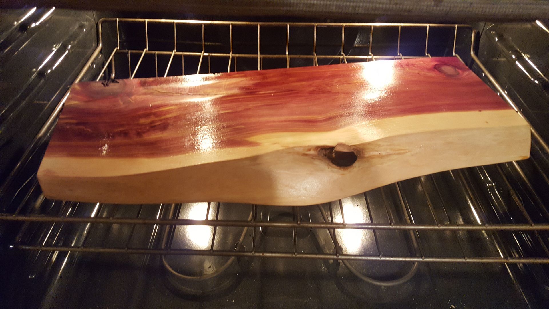 cedar project piece in oven baking glaze