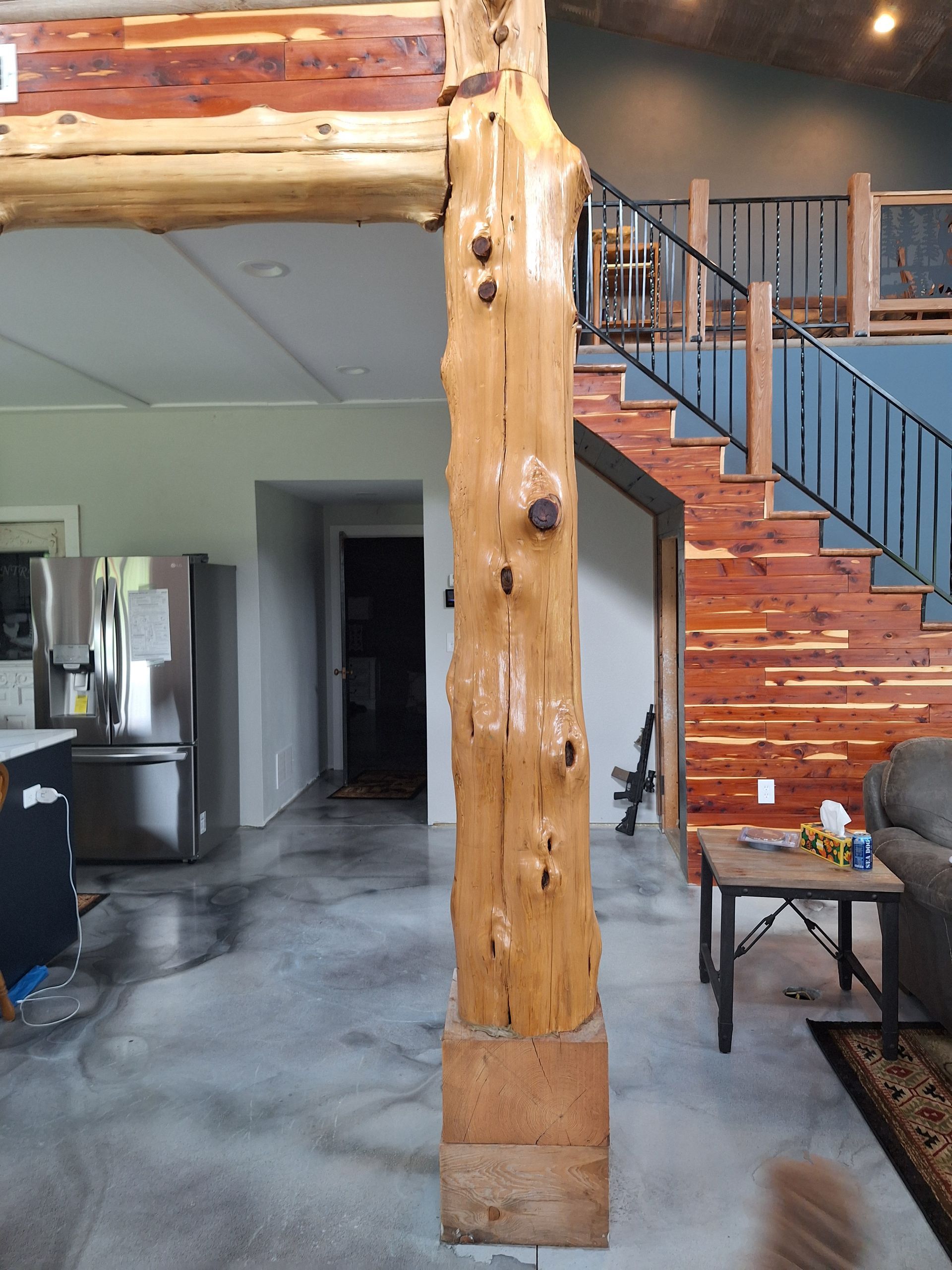 Snellen Wood Products employee sanding a cedar plank