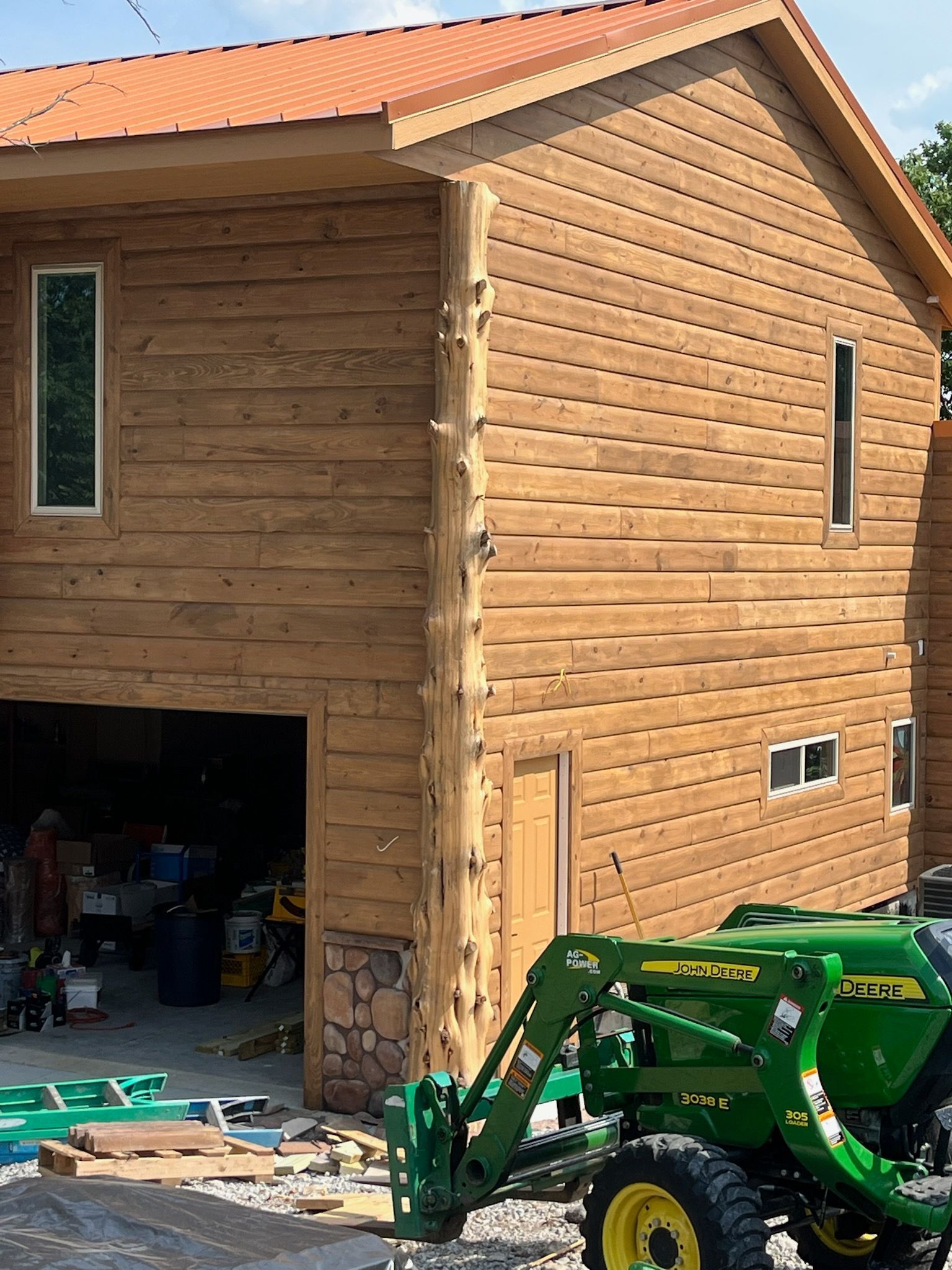 House with structural cedar posts at corners