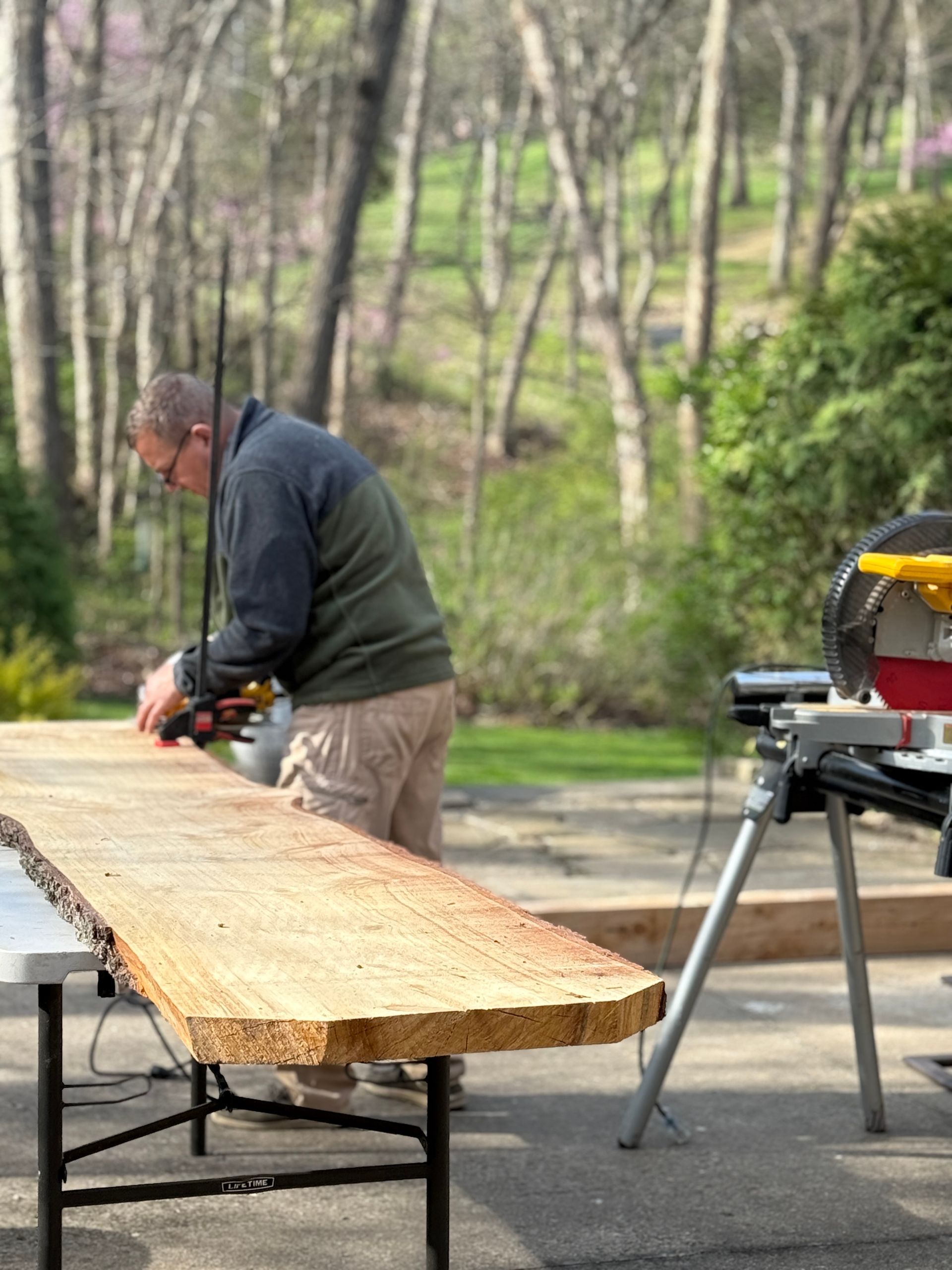 Snellen employee working on cedar slab