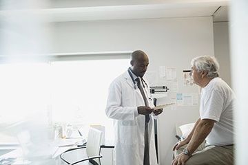 doctor examining patient