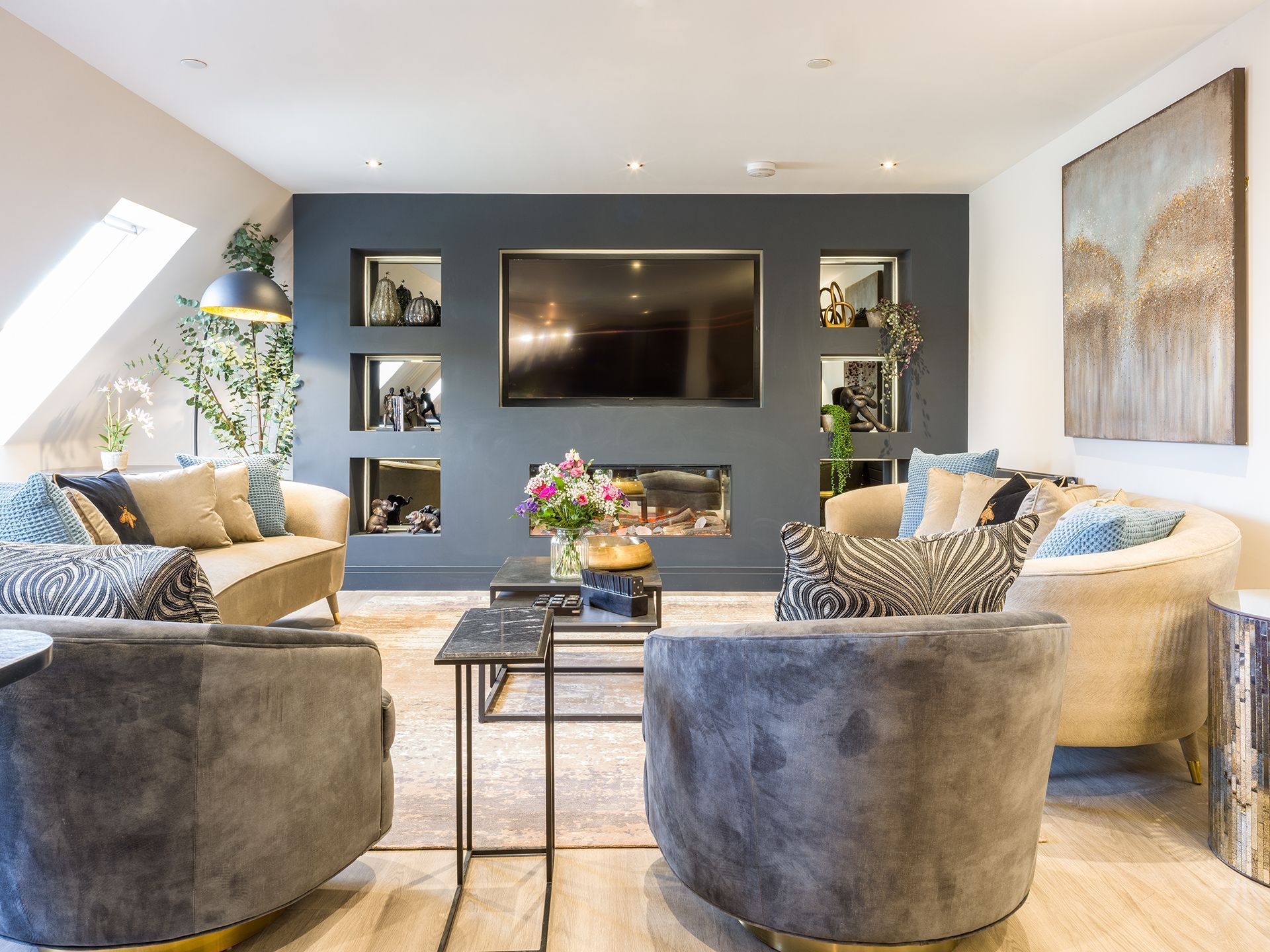 A living room filled with furniture and a flat screen tv.