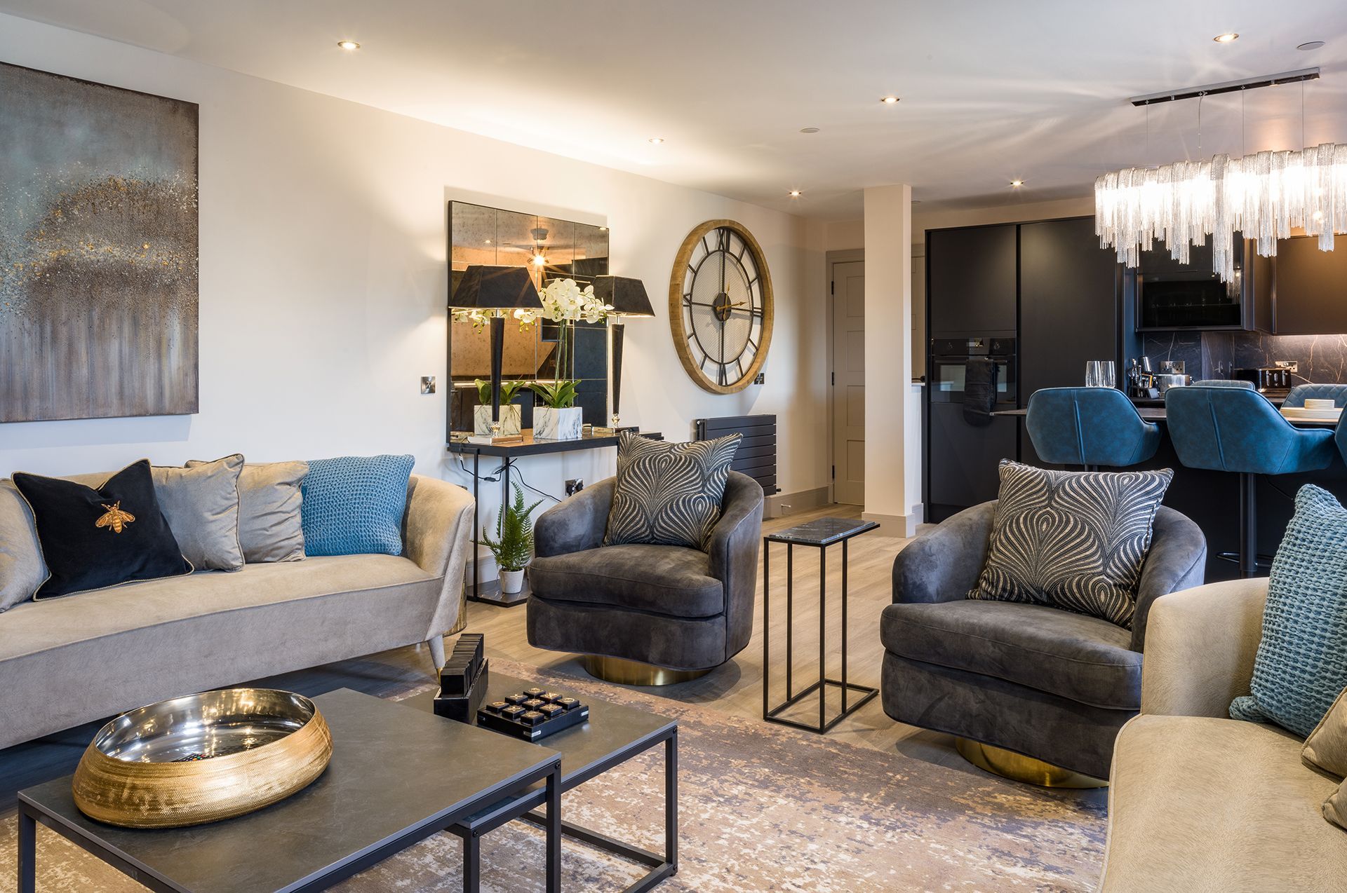 A kitchen with black cabinets and a window