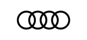 Le logo Audi est un cercle noir et blanc sur fond blanc.