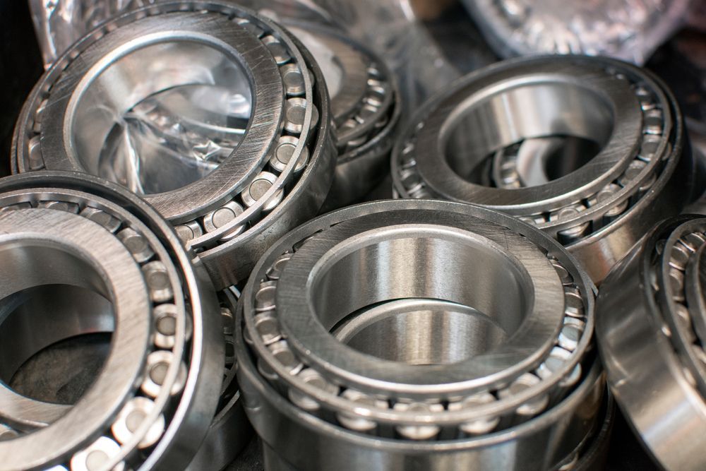 A Bunch of Metal Bearings Are Stacked on Top of Each Other — Coffs Harbour Bearing Centre in Coffs Harbour, NSW