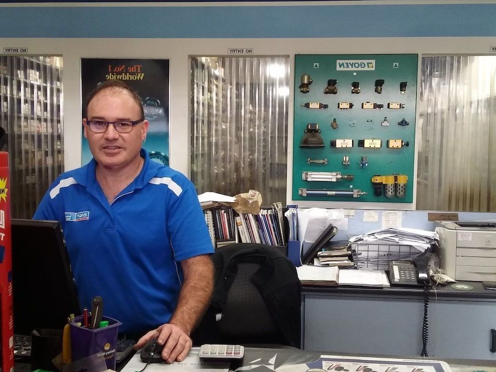 A Man in a Blue Shirt — Coffs Harbour Bearing Centre in Coffs Harbour, NSW
