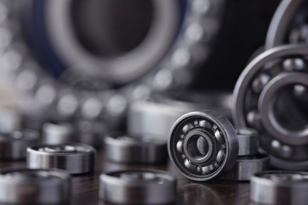 A Bunch of Bearings Are Sitting on a Table — Coffs Harbour Bearing Centre in Coffs Harbour, NSW