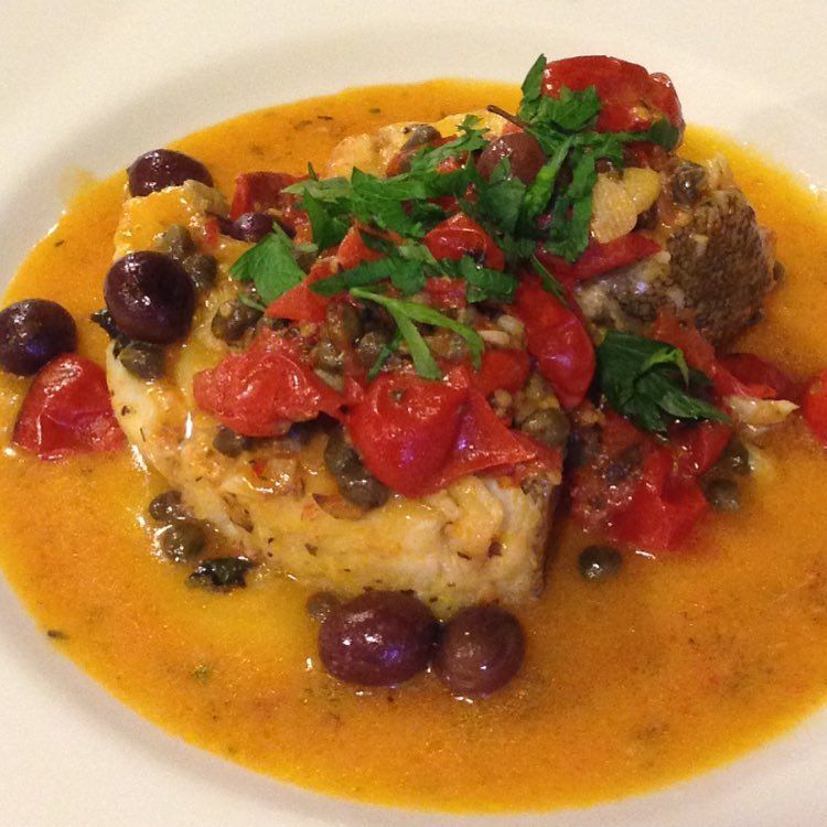 Merluzzo with cherry tomatoes and olives