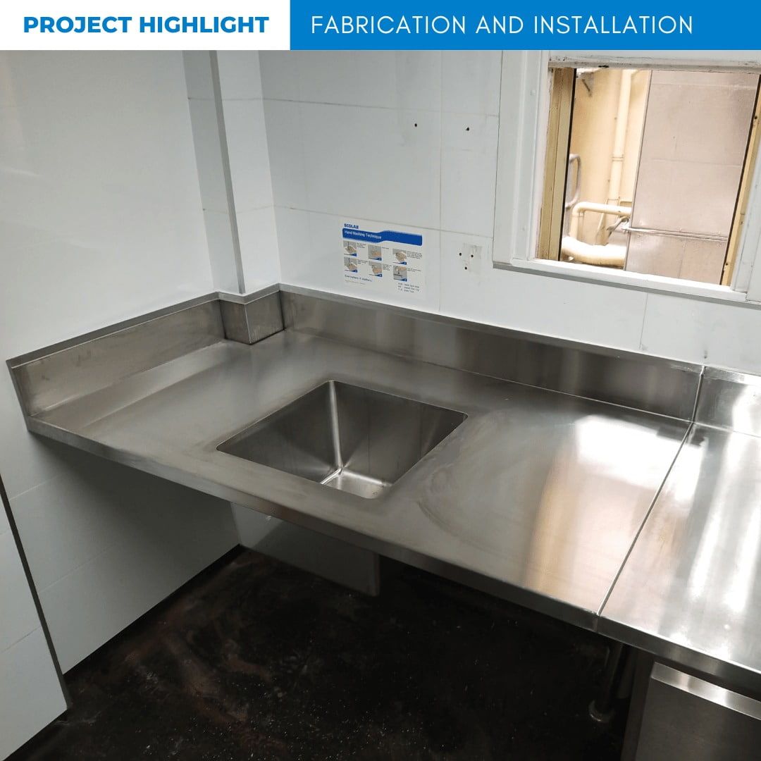 Stainless Steel Countertop With Integrated Sink in a Room — Highlander Metals in Bondi, NSW