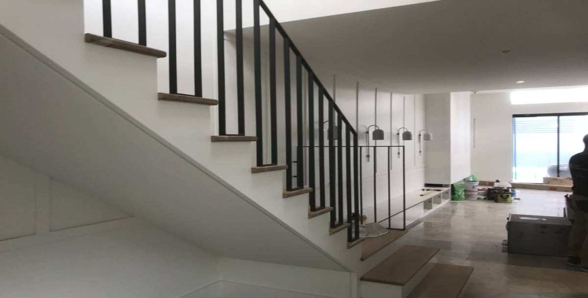 A Modern Staircase With White Closed Risers — Highlander Metals in Kirrawee, NSW