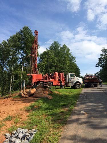 Trucks on work - Russell Well Drilling in Taylorsville, NC