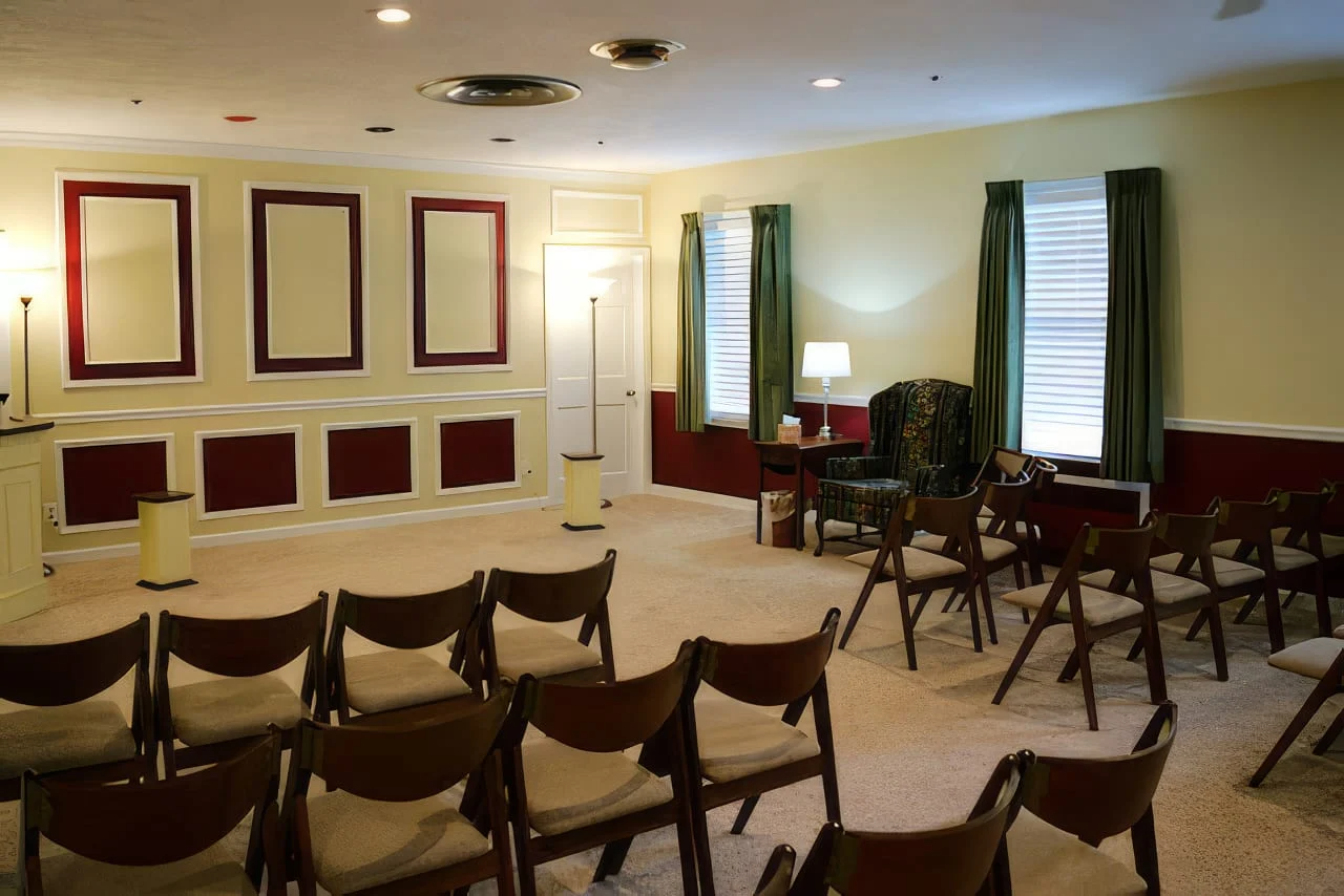 A room with a lot of chairs in it