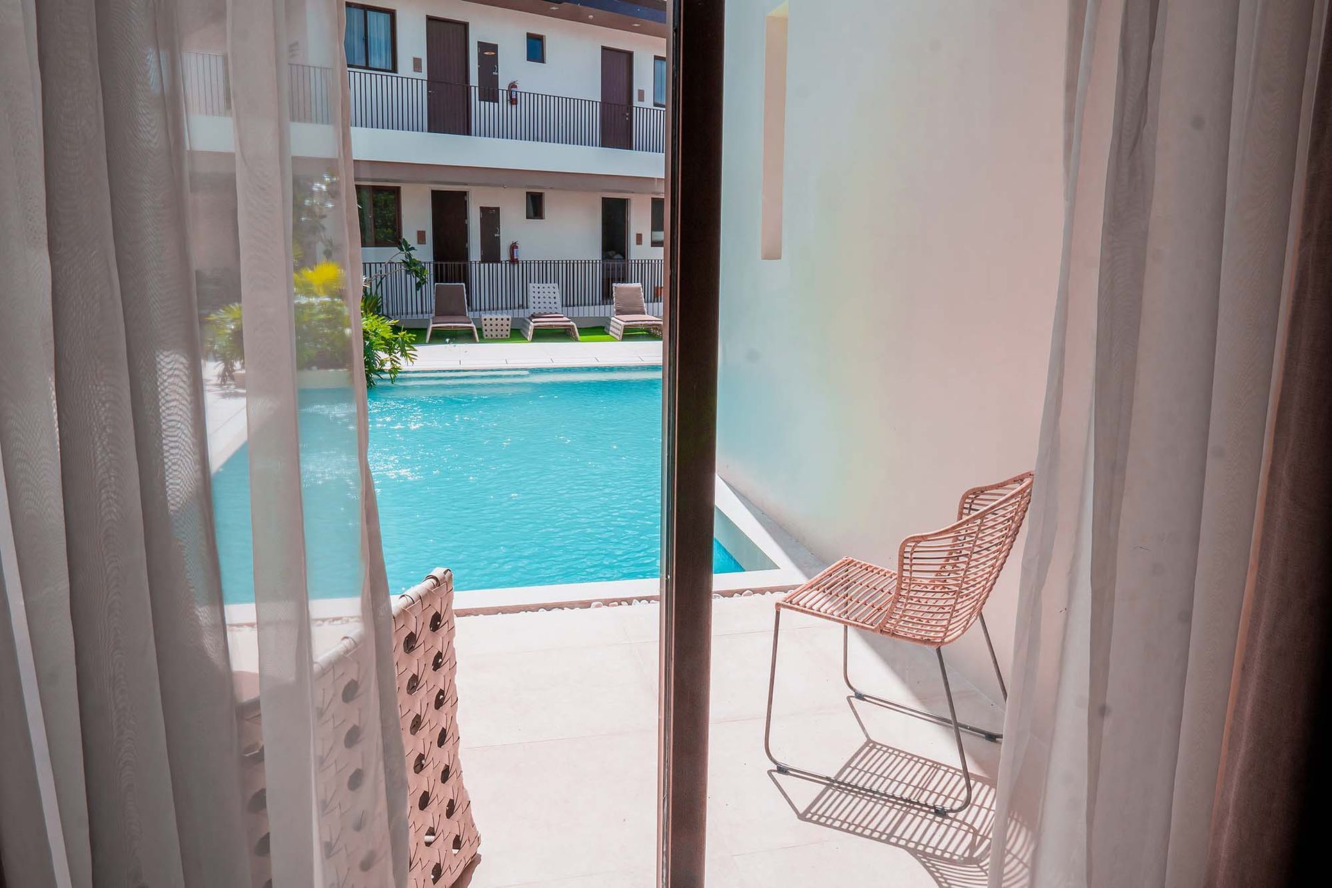 Swimming pool access from a hotel room.