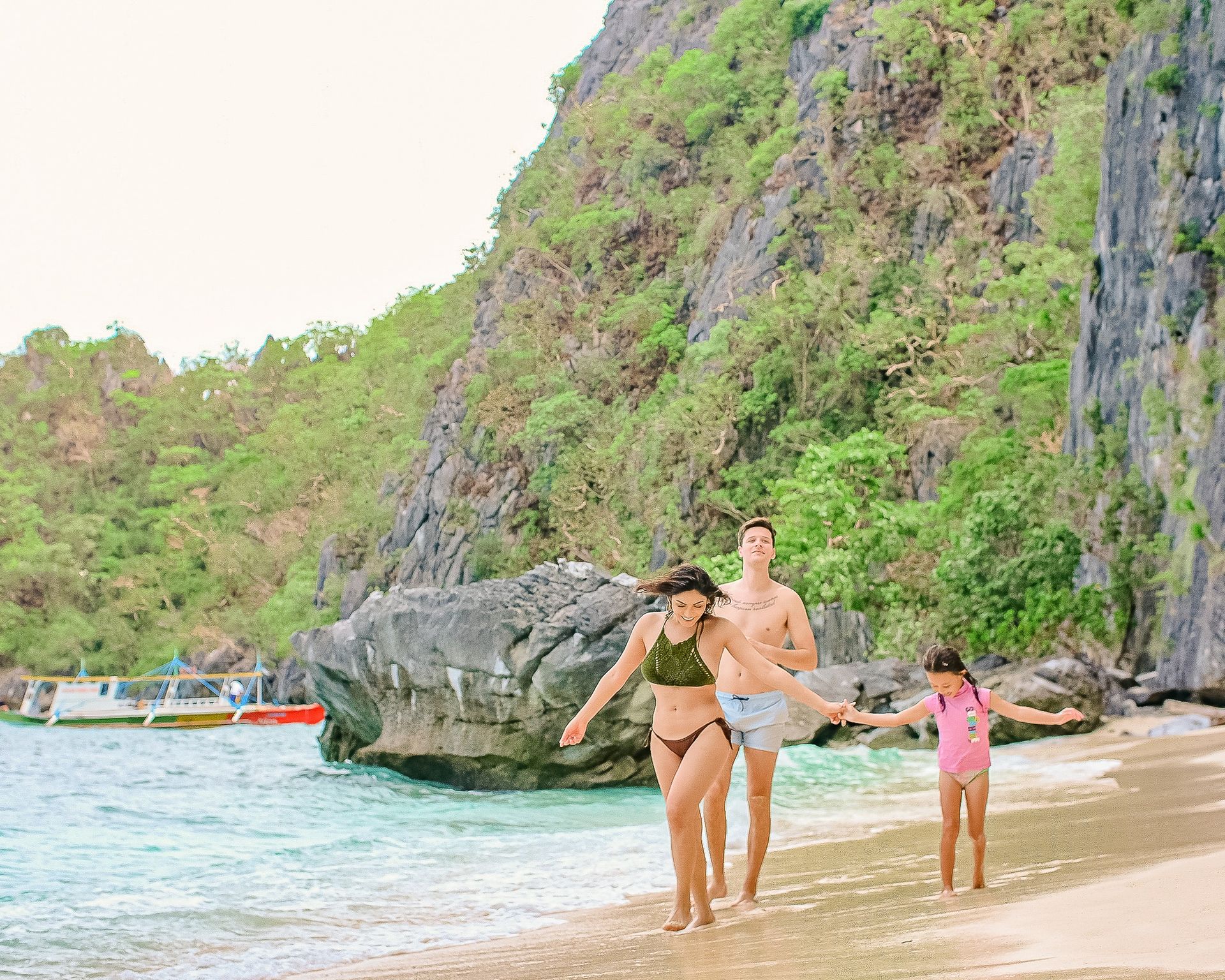 A family having fun at a beach in el nido palawan