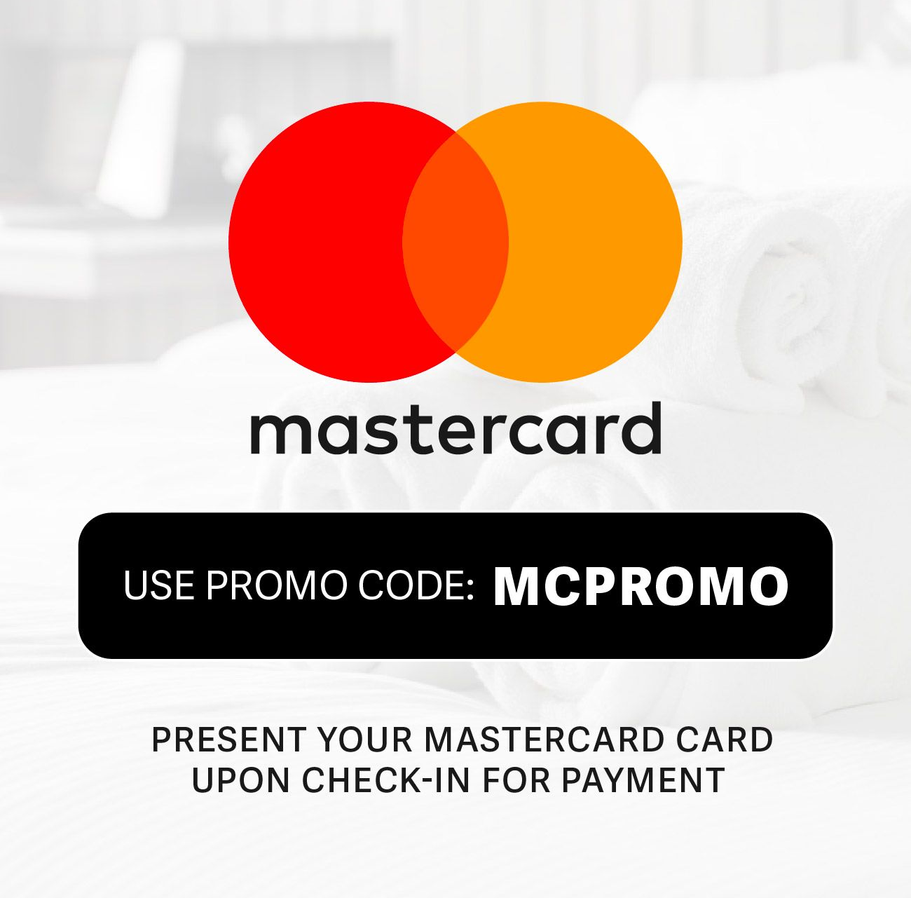Mastercard promotion: Use code MCPROMO. Present card at check-in for payment, set against white towels.