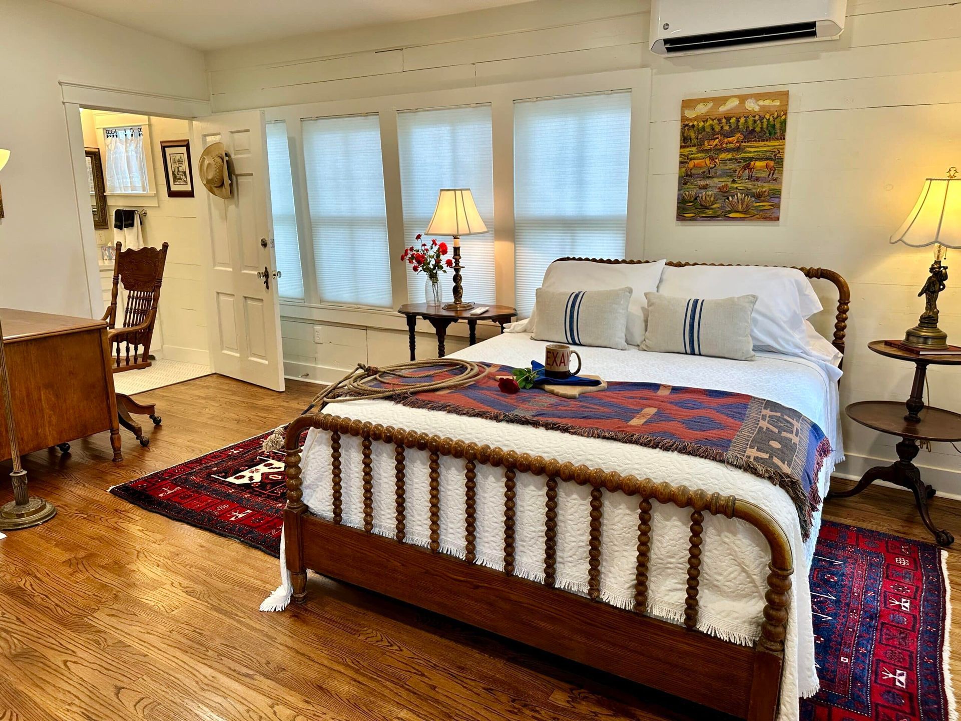 There is a large bed in the middle of the room.