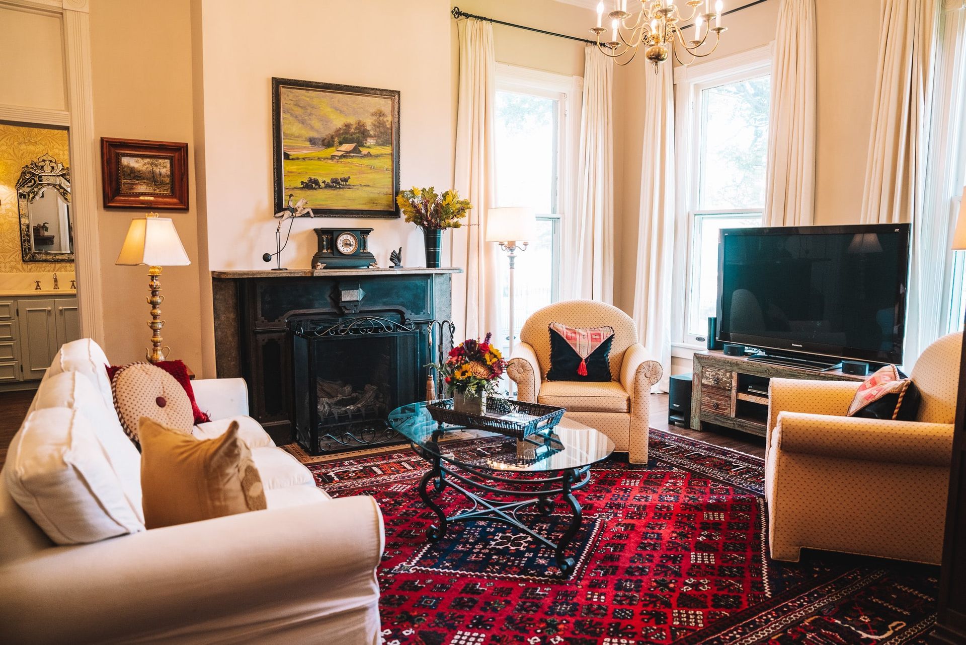A living room filled with furniture and a fireplace.