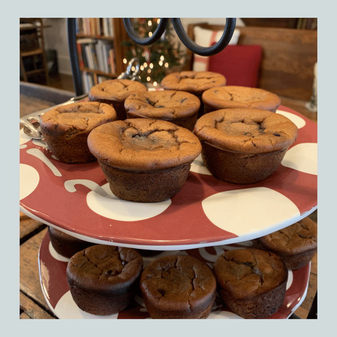 A red and white plate with cupcakes on it