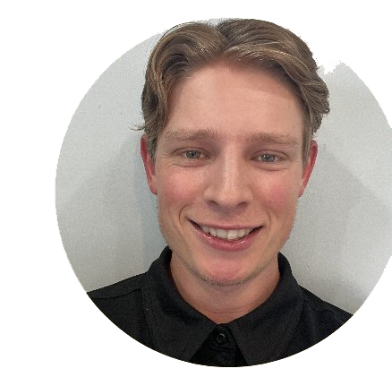 A man in a black shirt is smiling in a circle.