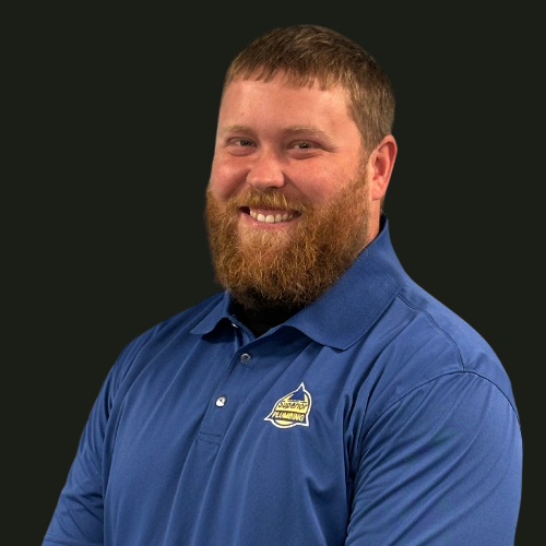 Service Plumber in Blue Collared Shirt
