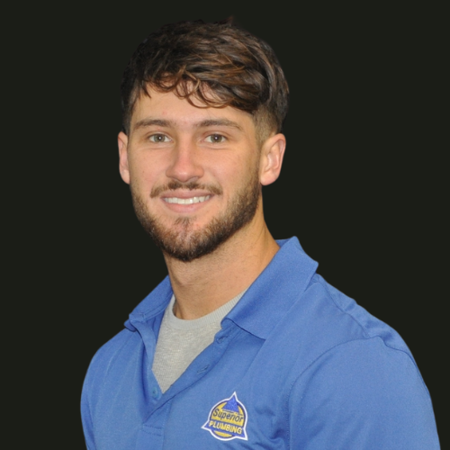 Service Plumber in Blue Collared Shirt