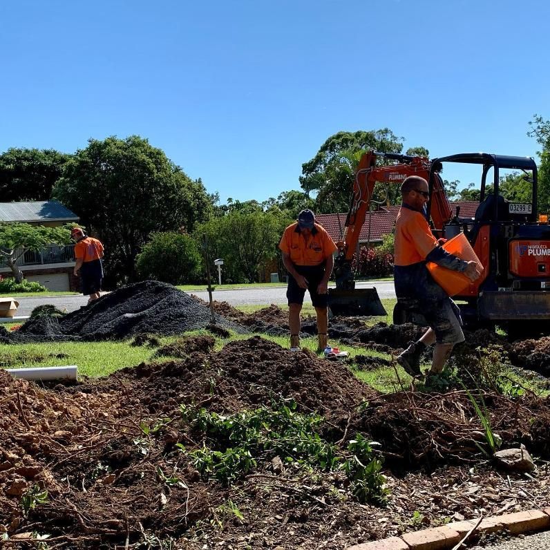 Construction Workers in Orange Shirts — Nambucca Plumbing in Crescent Head, NSW