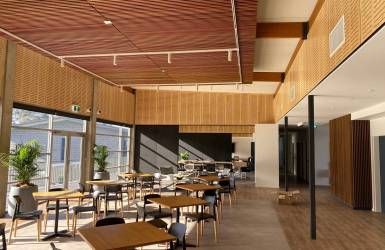 An Artist's Impression of A Restaurant with Tables and Chairs — Nambucca Plumbing in Nambucca Heads, NSW