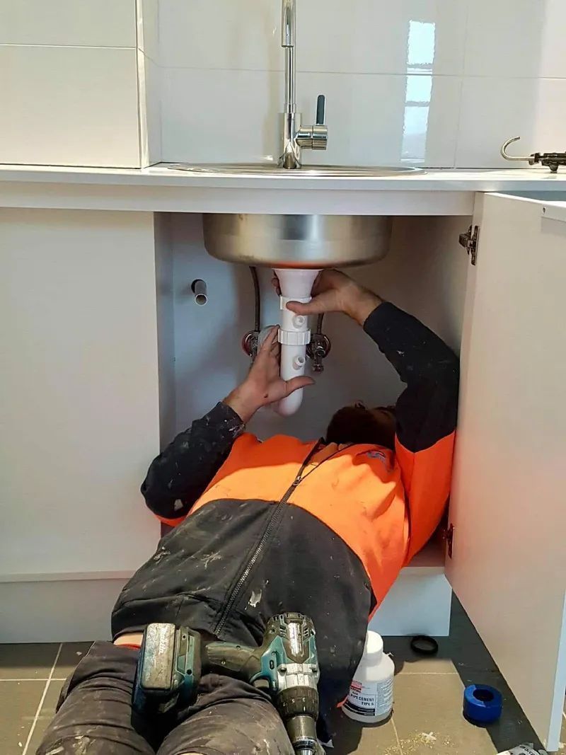 There Are a Lot of Pipes on The Roof of A Building — Nambucca Plumbing in Bellingen, NSW